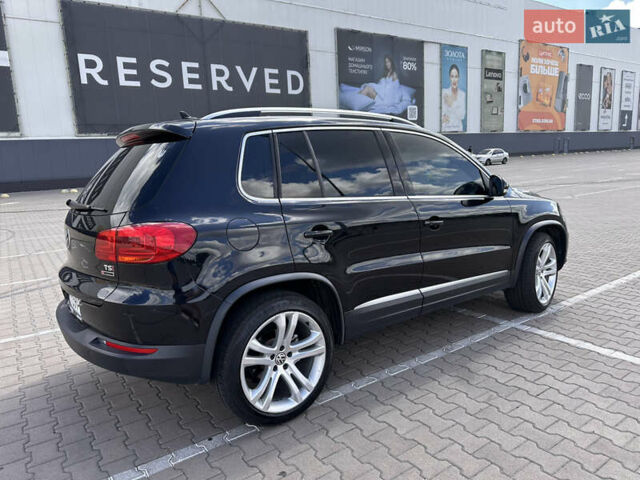 Чорний Фольксваген Тігуан, об'ємом двигуна 1.98 л та пробігом 180 тис. км за 14600 $, фото 2 на Automoto.ua
