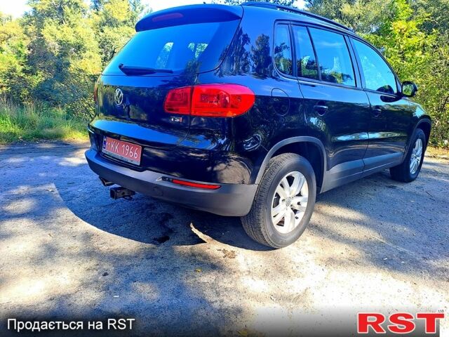 Черный Фольксваген Тигуан, объемом двигателя 2 л и пробегом 182 тыс. км за 14000 $, фото 1 на Automoto.ua