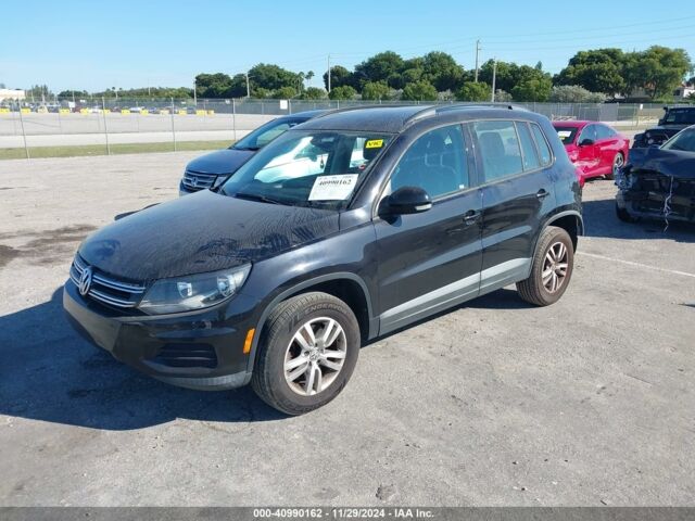 Черный Фольксваген Тигуан, объемом двигателя 2 л и пробегом 166 тыс. км за 9300 $, фото 2 на Automoto.ua