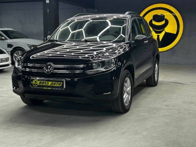 Чорний Фольксваген Тігуан, об'ємом двигуна 2 л та пробігом 133 тис. км за 14400 $, фото 2 на Automoto.ua