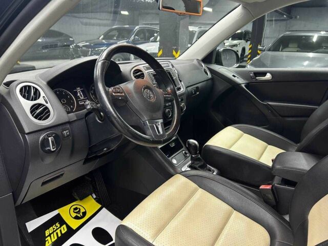 Чорний Фольксваген Тігуан, об'ємом двигуна 2 л та пробігом 133 тис. км за 14400 $, фото 7 на Automoto.ua