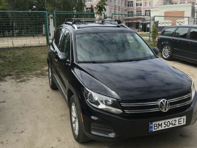 Черный Фольксваген Тигуан, объемом двигателя 2 л и пробегом 131 тыс. км за 14000 $, фото 1 на Automoto.ua