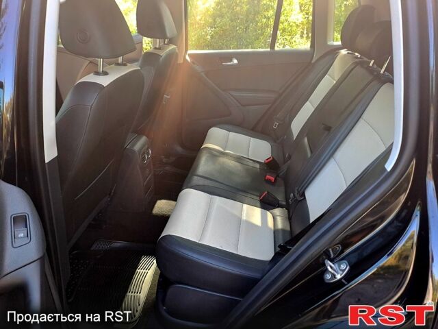 Черный Фольксваген Тигуан, объемом двигателя 2 л и пробегом 182 тыс. км за 14000 $, фото 5 на Automoto.ua