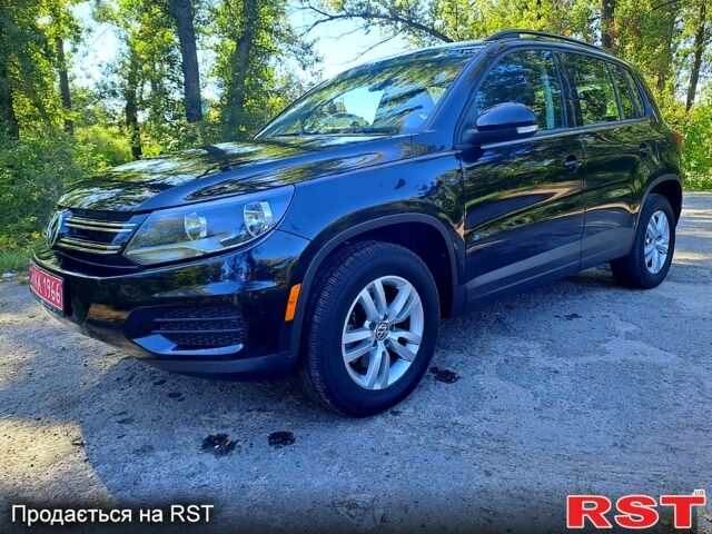 Черный Фольксваген Тигуан, объемом двигателя 2 л и пробегом 182 тыс. км за 14000 $, фото 2 на Automoto.ua