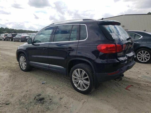 Чорний Фольксваген Тігуан, об'ємом двигуна 2 л та пробігом 64 тис. км за 1200 $, фото 1 на Automoto.ua