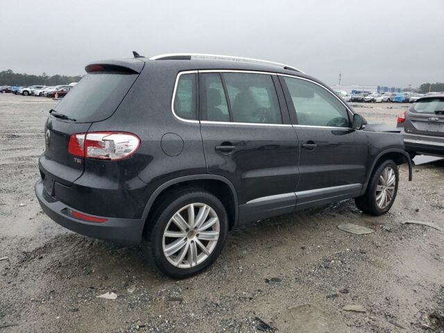 Черный Фольксваген Тигуан, объемом двигателя 2 л и пробегом 125 тыс. км за 8900 $, фото 5 на Automoto.ua