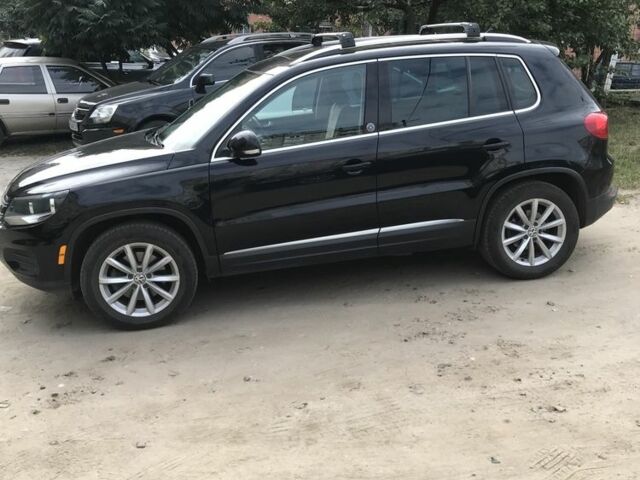 Черный Фольксваген Тигуан, объемом двигателя 2 л и пробегом 131 тыс. км за 14000 $, фото 2 на Automoto.ua