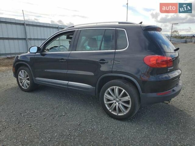 Чорний Фольксваген Тігуан, об'ємом двигуна 1.98 л та пробігом 105 тис. км за 1000 $, фото 1 на Automoto.ua
