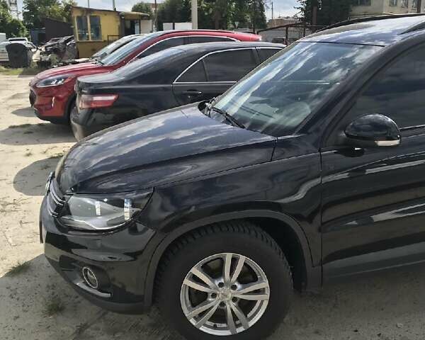 Черный Фольксваген Тигуан, объемом двигателя 1.98 л и пробегом 85 тыс. км за 14000 $, фото 3 на Automoto.ua