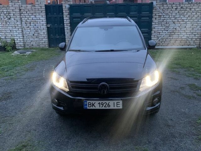 Черный Фольксваген Тигуан, объемом двигателя 2 л и пробегом 148 тыс. км за 13500 $, фото 1 на Automoto.ua