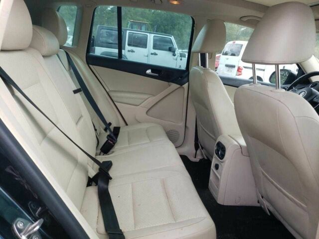 Чорний Фольксваген Тігуан, об'ємом двигуна 2 л та пробігом 64 тис. км за 1200 $, фото 10 на Automoto.ua