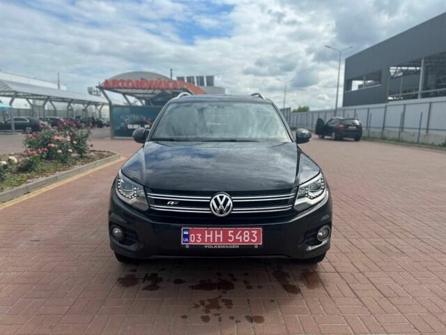 Чорний Фольксваген Тігуан, об'ємом двигуна 2 л та пробігом 220 тис. км за 14000 $, фото 1 на Automoto.ua