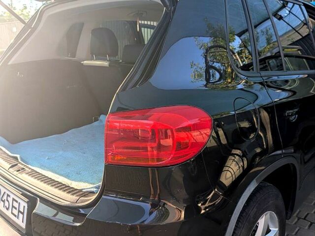 Чорний Фольксваген Тігуан, об'ємом двигуна 2 л та пробігом 139 тис. км за 13200 $, фото 2 на Automoto.ua