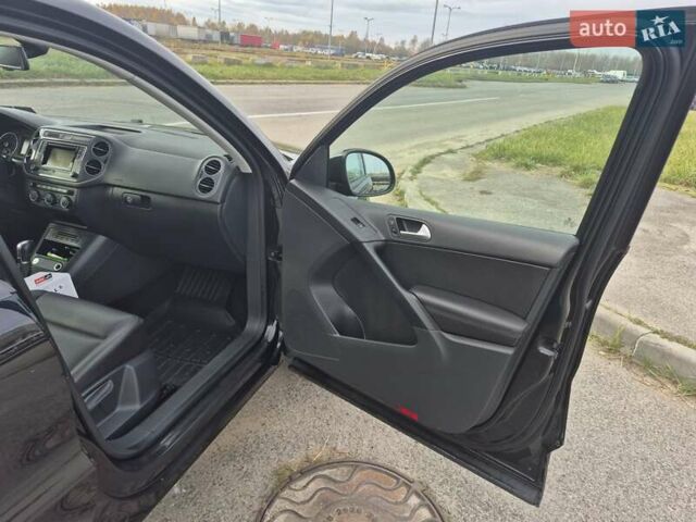 Чорний Фольксваген Тігуан, об'ємом двигуна 2 л та пробігом 135 тис. км за 13850 $, фото 6 на Automoto.ua