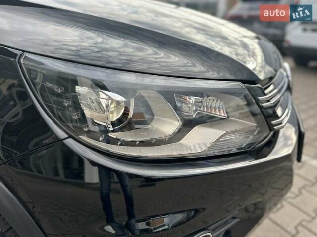 Чорний Фольксваген Тігуан, об'ємом двигуна 1.98 л та пробігом 155 тис. км за 14999 $, фото 18 на Automoto.ua