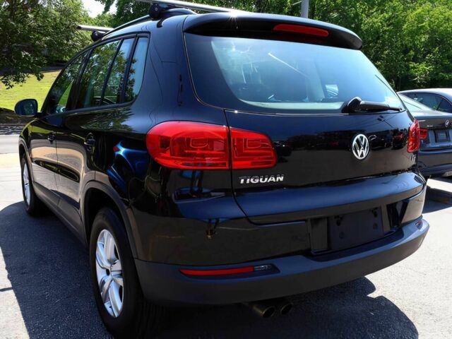 Черный Фольксваген Тигуан, объемом двигателя 2 л и пробегом 77 тыс. км за 5600 $, фото 3 на Automoto.ua