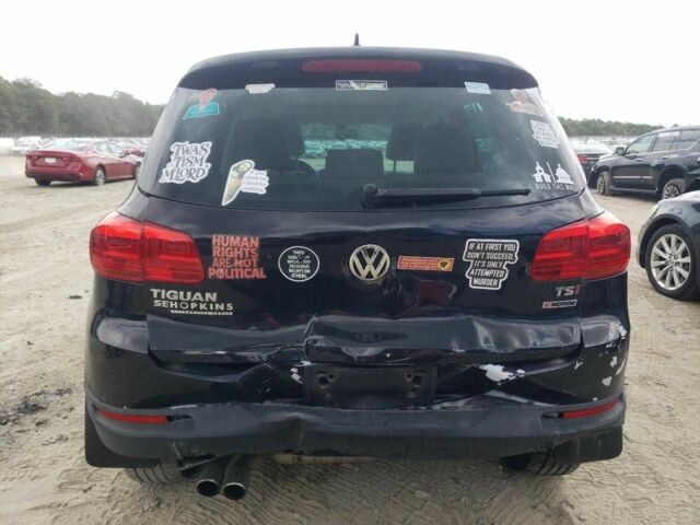 Чорний Фольксваген Тігуан, об'ємом двигуна 2 л та пробігом 64 тис. км за 1200 $, фото 5 на Automoto.ua