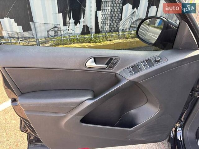 Чорний Фольксваген Тігуан, об'ємом двигуна 1.98 л та пробігом 180 тис. км за 14500 $, фото 1 на Automoto.ua