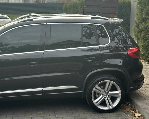 Чорний Фольксваген Тігуан, об'ємом двигуна 2 л та пробігом 207 тис. км за 14200 $, фото 6 на Automoto.ua