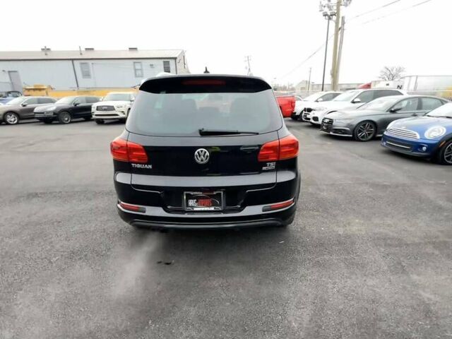 Черный Фольксваген Тигуан, объемом двигателя 2 л и пробегом 94 тыс. км за 2900 $, фото 2 на Automoto.ua