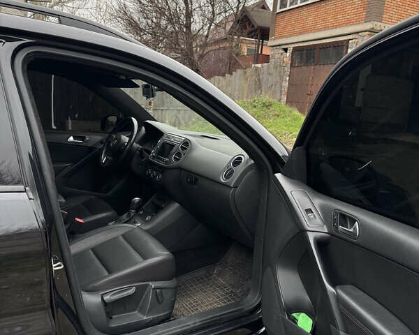 Черный Фольксваген Тигуан, объемом двигателя 2 л и пробегом 148 тыс. км за 13500 $, фото 13 на Automoto.ua