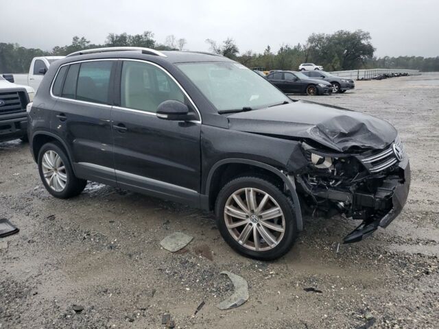 Черный Фольксваген Тигуан, объемом двигателя 2 л и пробегом 125 тыс. км за 8900 $, фото 2 на Automoto.ua