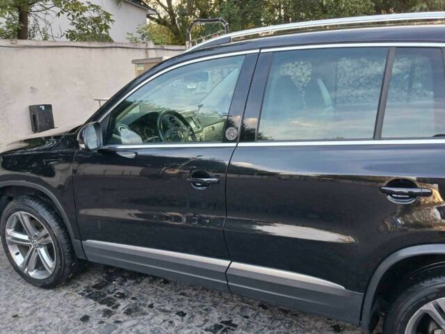 Черный Фольксваген Тигуан, объемом двигателя 2 л и пробегом 127 тыс. км за 13300 $, фото 3 на Automoto.ua