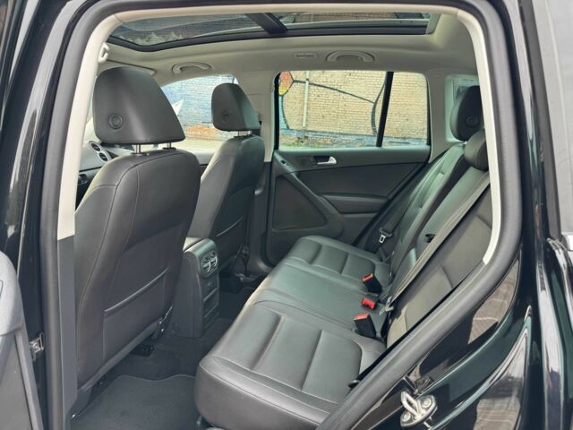 Чорний Фольксваген Тігуан, об'ємом двигуна 2 л та пробігом 157 тис. км за 13499 $, фото 21 на Automoto.ua