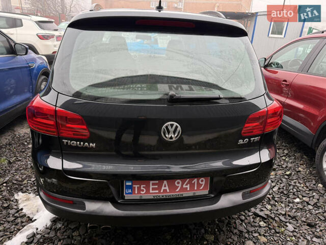Чорний Фольксваген Тігуан, об'ємом двигуна 2 л та пробігом 155 тис. км за 11600 $, фото 4 на Automoto.ua