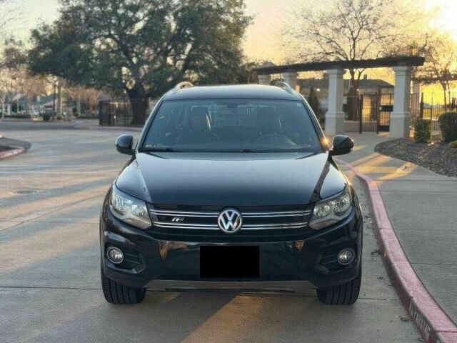 Черный Фольксваген Тигуан, объемом двигателя 2 л и пробегом 112 тыс. км за 7800 $, фото 1 на Automoto.ua