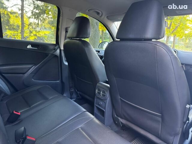 Черный Фольксваген Тигуан, объемом двигателя 2 л и пробегом 260 тыс. км за 12990 $, фото 32 на Automoto.ua