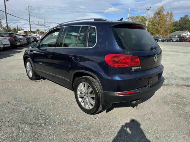 Чорний Фольксваген Тігуан, об'ємом двигуна 2 л та пробігом 80 тис. км за 5800 $, фото 6 на Automoto.ua