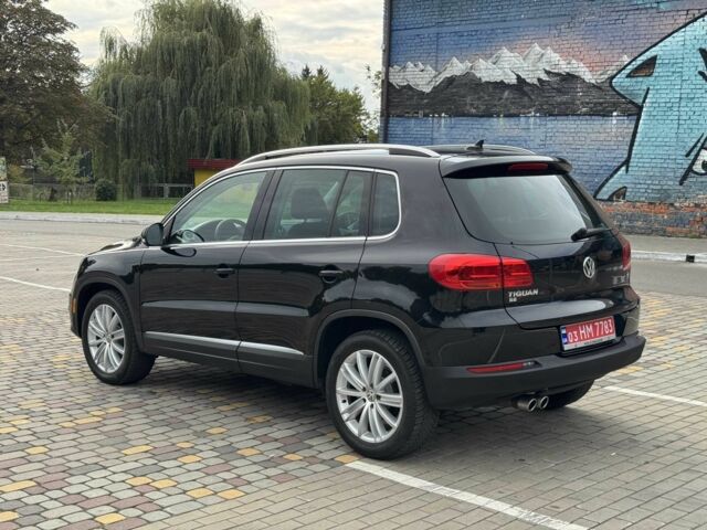 Чорний Фольксваген Тігуан, об'ємом двигуна 2 л та пробігом 157 тис. км за 13499 $, фото 6 на Automoto.ua