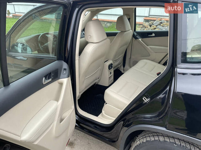 Черный Фольксваген Тигуан, объемом двигателя 2 л и пробегом 166 тыс. км за 13990 $, фото 23 на Automoto.ua