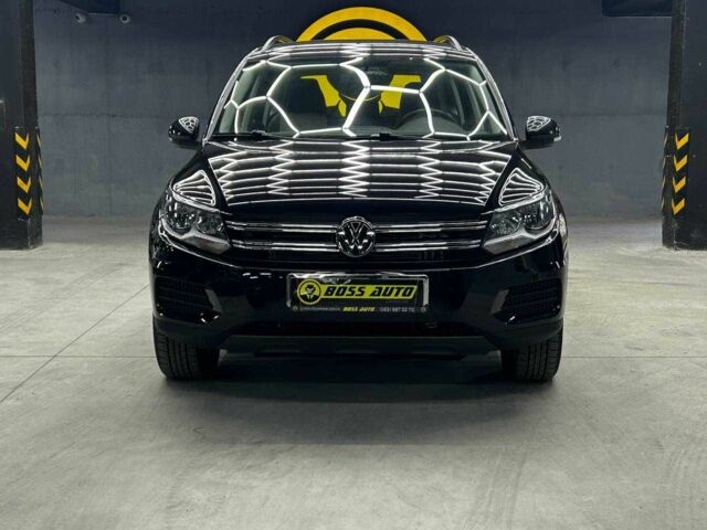 Чорний Фольксваген Тігуан, об'ємом двигуна 2 л та пробігом 133 тис. км за 14400 $, фото 1 на Automoto.ua