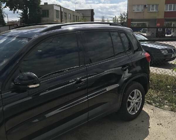 Черный Фольксваген Тигуан, объемом двигателя 1.98 л и пробегом 85 тыс. км за 14000 $, фото 2 на Automoto.ua