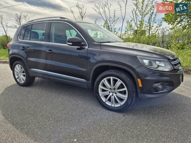 Чорний Фольксваген Тігуан, об'ємом двигуна 1.98 л та пробігом 190 тис. км за 13400 $, фото 1 на Automoto.ua