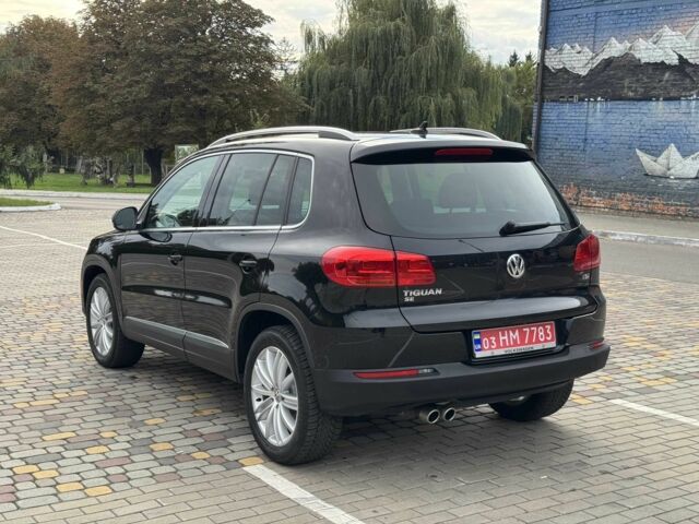 Чорний Фольксваген Тігуан, об'ємом двигуна 2 л та пробігом 157 тис. км за 13499 $, фото 7 на Automoto.ua