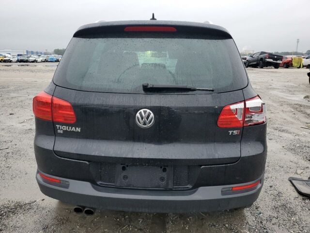 Черный Фольксваген Тигуан, объемом двигателя 2 л и пробегом 125 тыс. км за 8900 $, фото 4 на Automoto.ua