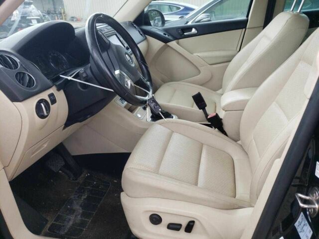 Чорний Фольксваген Тігуан, об'ємом двигуна 2 л та пробігом 64 тис. км за 1200 $, фото 6 на Automoto.ua