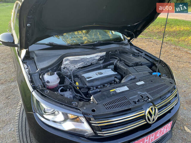 Чорний Фольксваген Тігуан, об'ємом двигуна 1.98 л та пробігом 124 тис. км за 13600 $, фото 38 на Automoto.ua