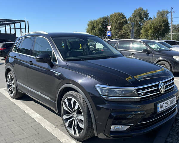 Чорний Фольксваген Тігуан, об'ємом двигуна 1.4 л та пробігом 283 тис. км за 19300 $, фото 2 на Automoto.ua