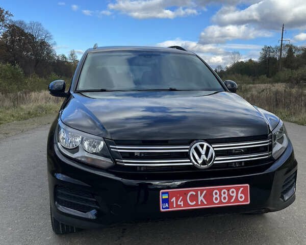 Черный Фольксваген Тигуан, объемом двигателя 1.98 л и пробегом 221 тыс. км за 11990 $, фото 1 на Automoto.ua