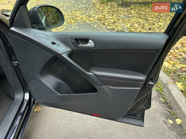 Черный Фольксваген Тигуан, объемом двигателя 1.98 л и пробегом 163 тыс. км за 14550 $, фото 26 на Automoto.ua