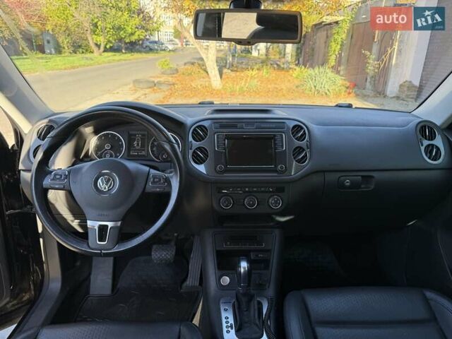 Черный Фольксваген Тигуан, объемом двигателя 1.98 л и пробегом 150 тыс. км за 15000 $, фото 2 на Automoto.ua