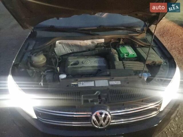 Чорний Фольксваген Тігуан, об'ємом двигуна 1.98 л та пробігом 105 тис. км за 1000 $, фото 10 на Automoto.ua