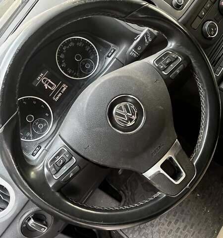 Чорний Фольксваген Тігуан, об'ємом двигуна 1.98 л та пробігом 230 тис. км за 10500 $, фото 2 на Automoto.ua