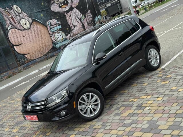 Чорний Фольксваген Тігуан, об'ємом двигуна 2 л та пробігом 157 тис. км за 13499 $, фото 3 на Automoto.ua