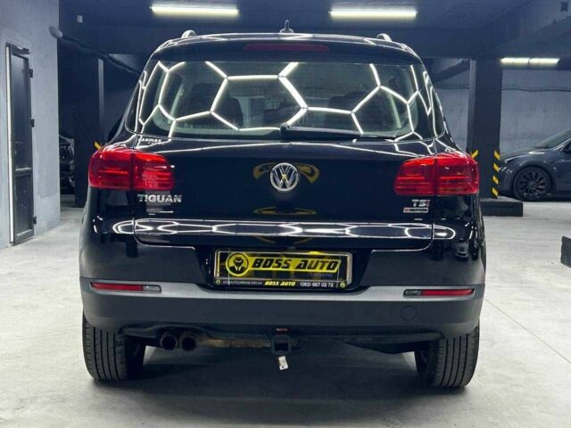 Чорний Фольксваген Тігуан, об'ємом двигуна 2 л та пробігом 133 тис. км за 14400 $, фото 4 на Automoto.ua
