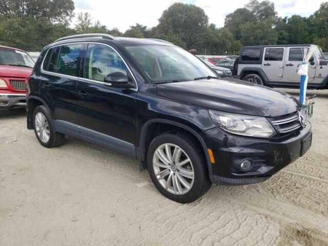 Чорний Фольксваген Тігуан, об'ємом двигуна 2 л та пробігом 64 тис. км за 1200 $, фото 3 на Automoto.ua